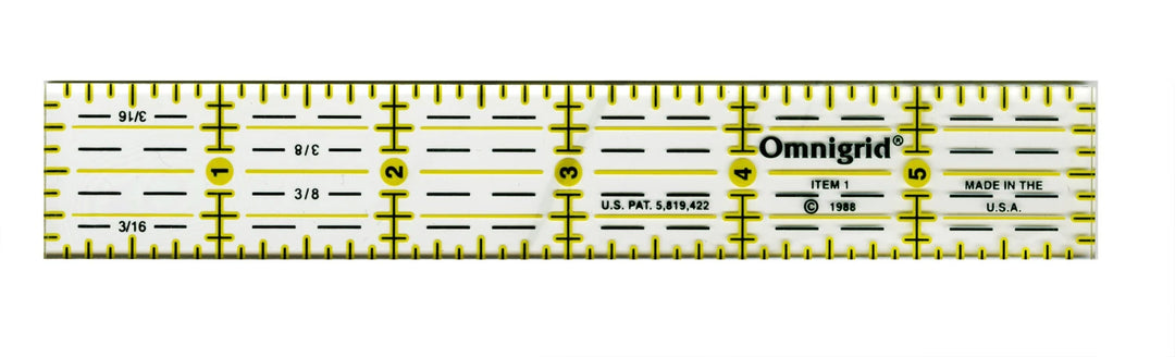 Omnigrid ruler with yellow markings on a white background